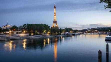 Night view on the river Seine and the Eiffel Tower