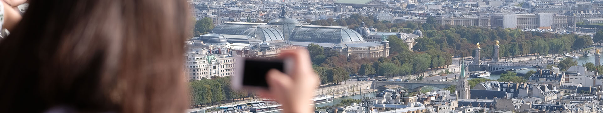 Take a photo from the 2nd floor of the Eiffel Tower