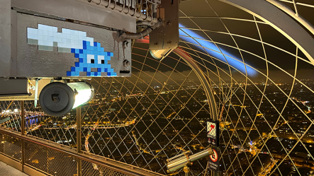 Invader at the top of the Eiffel Tower